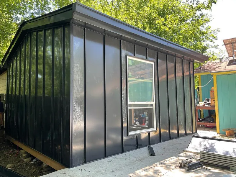 Black standing seam metal wall panels for Metal Roof Installation in West Haven